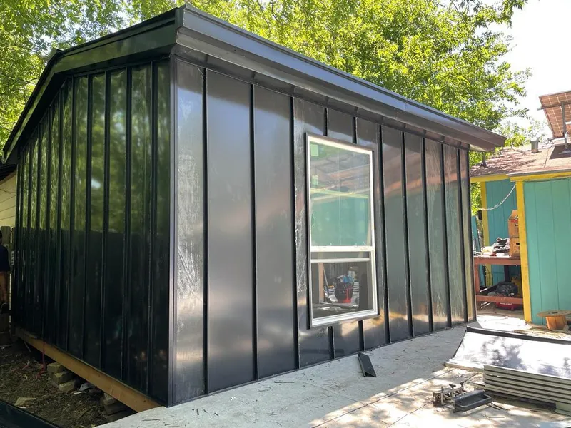 Black standing seam metal wall panels for Roof Inspection in Royal Oak