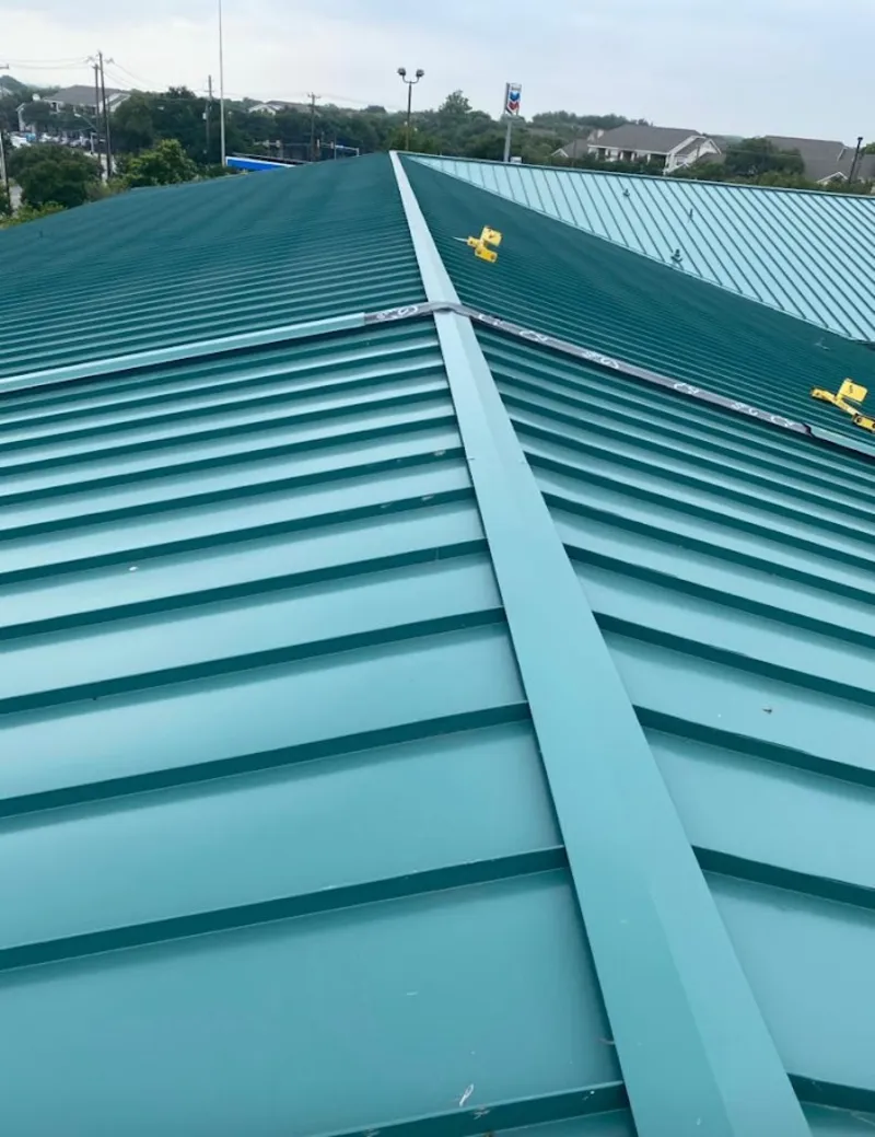 Green commercial metal roof ridge and valley for Metal Roof Repair in Royal Oak